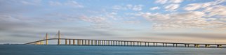 Jon Glaser, 'A Bridge Moves', 2015, original Photography Color, 44 x 10  x 1 inches. Artwork description: 2307  I took this photograph at sunrise in St. Petersburgh, Florida at the Skyway Bridge. The bridge connects St. Peterburgh to Tampa, Florida.This photograph measures approximately 10x40 and ready to hang. It comes mounted and varnished in a white wood frame. The varnish protects the print from ...