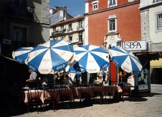 Ruth Zachary, 'Umbrellas Of Lisbon', 1996, original Photography Color, 14 x 11  x 1 inches. Artwork description: 3099  Cheerful, charming row of umbrellas. Charming street scene. Take a seat and order a coffee. People- watch. Interesting lines and colorful contrast.  Lisbon, Portugal.  5 x 7 in an 11 x 14 acid free mat. Signed and titled. Larger size available.  Enjoy! ...