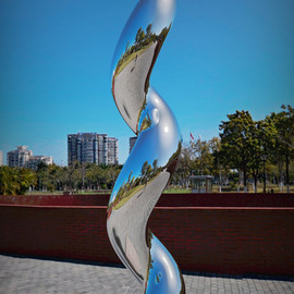 Daniel Kei Wo: 'continuum1', 2018 Steel Sculpture, Abstract. Artist Description:  Continuum  spirals upward, a mirror- finish sculpture that twists reality, bending the light and space around it. Reflecting the surroundings, it invites viewers to contemplate the fluidity of time and the seamless flow of life s moments. Through this work, I wish to offer a space for reflectionaEUR