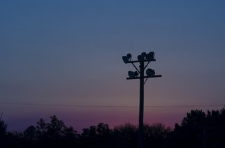 Dion Mcinnis: 'Dusk Lights', 2007 Color Photograph, Sky.  Light poles in front of sunset sky.  Print comes mounted in window mat. ...