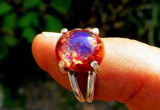 Alberto Thirion: 'fire opal ring and silver', 2021 Jewelry, Beauty. October Birthstone: Opal JewelryMexican quarry opal ringSize: 6. 5 USA measureTotal weight  3. 7 grams The measurements of the stone are approximate  ...