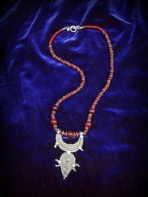 Judith Mitchell: 'Mythogems VIII', 2012 Beads, Fashion.  An antique Tuareg sterling pendant with the crescent moon; dark blood- red carnelian beads and sterling beads like stars. This is worthy of Scheherazade' s jewel- chest. ...
