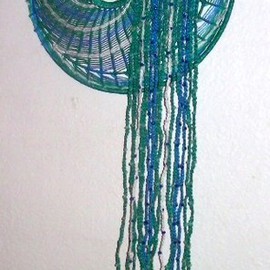 Kathie Freeman: 'Swirligig Redux', 2012 Fiber, Geometric. Artist Description:  Hand- knotted over a wire frame, this colorful contemporary macrame design is perfect for almost any room. Predominate colors are blue, green and white.Measures 18 inches in diameter with 36- inch dreadlocks ...