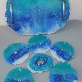 Rayana Dissel: 'ocean breeze', 2021 Other, Other. Artist Description: Ocean inspired Resin Tray and Coaster Set of 6.this lovely set is done with your colors of the Ocean, Turquoise, and shades of Blue with White accents.  Glass stones and shells adorn this Unique Tray with brushed nickel handles.  I used a free form style of making ...