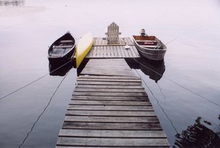 Ruth Zachary: 'Away From It All', 2004 Color Photograph, Boating.  Summer at the lake.  Canoes, the back of an old Adirondack chair on wooden dock. Tranquility, nostalgia. Belgrade Lakes, Maine.  11 x 14