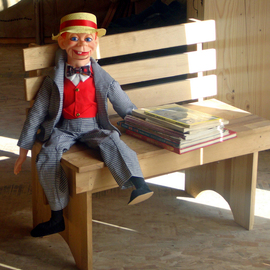 Debbi Chan Artwork dummy with reading material, 2010 Color Photograph, Clowns