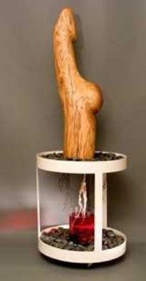 Artist: George Transcender - Title: natural childbirth - Medium: Wood Sculpture - Year: 1990