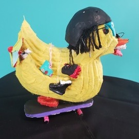 Valentina Vaillant: 'never not gonna skate again', 2023 Other Sculpture, Animals. Artist Description: This duck reprisents me by loving to skate. I love to skate cuz it makes me feel good when im feeling down and I love the speed. This shows the silly side and I like it cuz its funny. Cardboard, clay, fabric, wire, wood, beads.  ...
