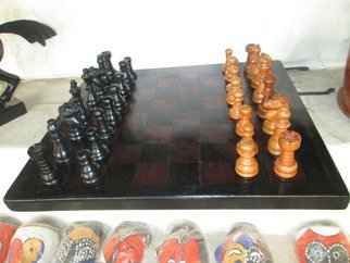 Artist: Dimitri Sonkeng - Title: Chess table made with ebony wood - Medium: Wood Sculpture - Year: 2015