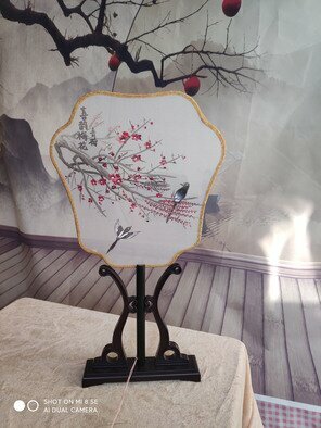 Qinghe Yang: 'fan painting plum blossom', 2022 Crafts, Birds. This is a real silkfan and has a beautiful painting that made by hand- drawing.  It can put on the desk for decorate the house or hold in your hand that will get you full classical quility. ...