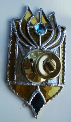 Arnold Cecchini; Door Knob Escutcheon, 2018, Original Glass Stained, 13 x 23 cm. Artwork description: 241 Materials used to construct the item are Stained Glass, Mirror, Copper, and silver solder.  For wood doors use wood screws that will fit in the support loops, metal screws for metal doors, and for Renters not wishing to damage property can use small patches of velcro with ...