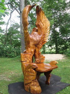 Von Nicholson; Eagle Chair, 2016, Original Woodworking, 36 x 80 inches. Artwork description: 241  The Eagle Chair was cut from a large piece of Willow and has glass panels that fit into the sides that serve as chair arms. 260 633 0818...