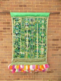 Christine Cunningham; Spring Garden, 2017, Original Textile, 40 x 66 inches. Artwork description: 241 Abstract creation exploring a Spring garden.  Layered panels were created using offcuts in a rich colour palette of greens and blues, overlaid with additional roughly cut lengths to create additional volume.  A large pompom fringe in a colour palette of spring flowers adorns the garden with a ...