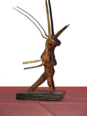 Gadadhar Das; DANCING DEER, 2005, Original Sculpture Wood, 10 x 17 cm. Artwork description: 241  This Art work was made from two pieces discarded tree roots. These pieces were collected from our garden. I made it in 2005. This Sculpture completely covered by a special type of wood coating for protect from termite  & borar. Weight of this Art Work is 0. 085 ...