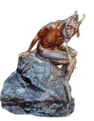 Devi Delavie; Seated Pan, 1984, Original Sculpture Bronze, 18 x 30 inches. Artwork description: 241 Pan or Bachus, he is the guardian of the forest and master of afternoon delights...