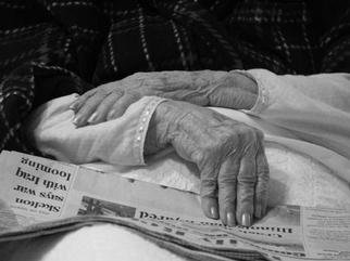 Dion Mcinnis; Aunt Elynors Hands, 2003, Original Photography Black and White, 10 x 8 inches. Artwork description: 241 Senior' s hands reading newspaper with pending Iraq war headlines.  Print comes mounted on window mat board. ...