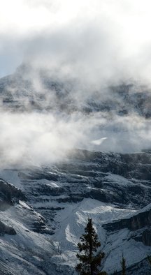 David Bechtol; In The Clouds, 2013, Original Photography Color, 19.7 x 36 inches. Artwork description: 241  Photographic Panorama derived from multiple images. Part of the Canadian Rockies Series. Nikon D70. Museum- quality, Durst Lambda archival photograph mounted on Dibond Aluminum panel. UV- protective matte finish applied. Ready for hanging using the supplied cleat system....
