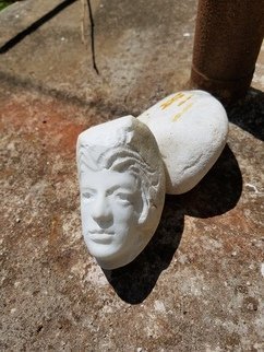 Andrew Wielawski; Face, 2018, Original Sculpture Marble, 1 x 2 inches. Artwork description: 241 A tiny head carved from a river stone. The world s best marble scraps were often thrown into the river I took this from, and could easily have been part of a block Michelangelo had cut from the mountains. His quarry was higher up the same river. ...