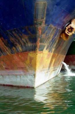 Ellen Spijkstra; 28, 2001, Original Photography Color, 27 x 41 inches. Artwork description: 241 Bow of a tanker. Dark blue, yellow, orange, white. Green water.Laminated with a clear, semi- matt, UV protection layer. ...