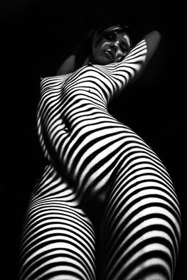 Mikhail Faletkin; Zebra, 2015, Original Photography Black and White, 60 x 90 cm. Artwork description: 241 I m very attracted to various shadows, as in the reportage genre photography, and in art nude.  The shadows of thezebraare probably quite a hackneyed theme, but sometimes I go back to it, and I m trying to find something new.  In this work, I sort of ...