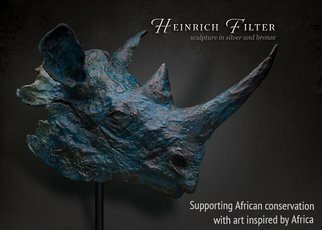 Heinrich Filter; Black Rhino Bust In Bronze, 2023, Original Sculpture Bronze, 35 x 37 cm. Artwork description: 241 Black Rhino Bust in Bronze Verdigris, Limited Edition of 12, bronze sculpture on Sandstone base.The first time I was sculpting in the field, all I saw oft this magnificent Black Rhino was its head sticking out from behind the bush.  The rhinos horn evolved as a ...