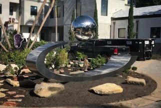 Hunter Brown; Eclipse, 2019, Original Sculpture Steel, 18 x 10 feet. Artwork description: 241 Eclipse is a contemporary stainless steel sculpture designed and commissioned to be placed at a residence in Winter Park, Florida. ...