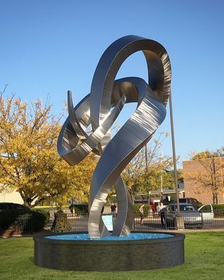 Hunter Brown; Embrace, 2020, Original Sculpture Steel, 16 x 25 feet. Artwork description: 241 Embrace is a monumental public art installations fabricated in marine grade stainless steel. The piece stands 25 H and spans 16 D. ...