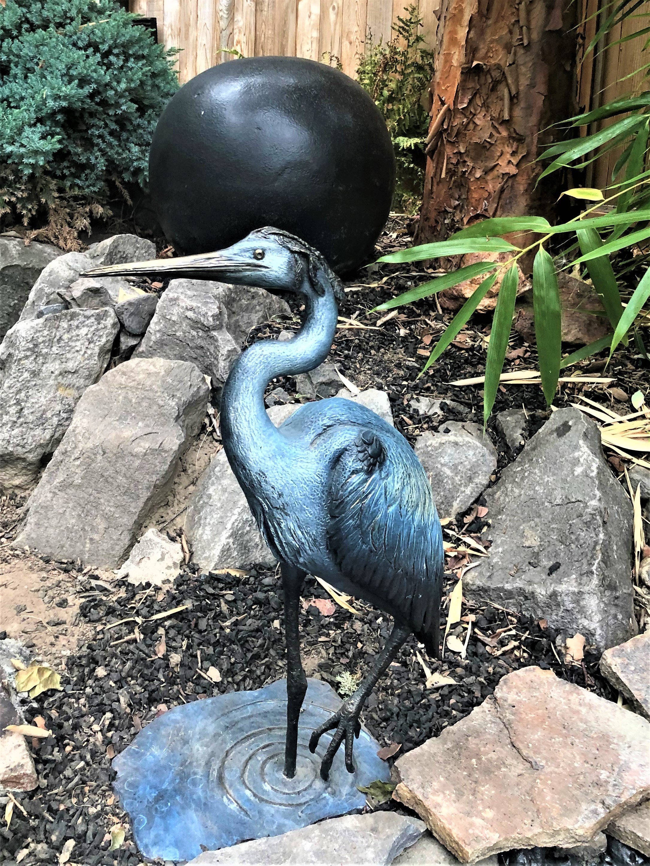 Joe Jumalon; Serentiy Blue Heron, 2019, Original Sculpture Bronze, 10 x 24 inches. Artwork description: 241 The Serenity Blue Heron is a limited edition of exquisite wildlife art.  Blue herons are waders, typically living along coastlines, in marshes, or near the shores of ponds and streams.  Most often they stand perfectly still in the water which creates a calm, even serene, scene.  These ...