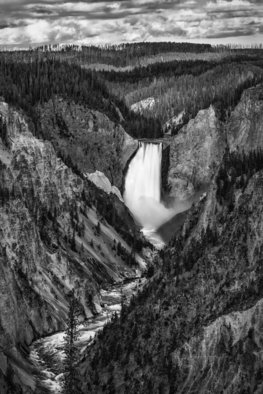 Jon Glaser, 'The Falls Power', 2013, original Photography Black and White, 24 x 16  x 1 inches. Artwork description: 3495   This photograph was taken in Yellowstone National Park at the Lower Yellowstone Falls viewpoint. It was very cold morning with a sky scattered with clouds which created shadows of light across the vast lands behind the waterfall. The Black and White rendition of this image accentuates the ...