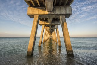 Jon Glaser, 'Venice Below The Pier', 2015, original Photography Color, 60 x 40  x 1 inches. Artwork description: 2307  This pier was located in Venice, Florida. I photographed this in the morning just as the sun was coming up.* This Limited edition photograph measures approximately 40x60 and is ready to hang. It comes mounted and varnished in a white wood frame. The varnish protects the print ...