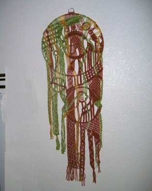 Kathie Freeman; The Ring Thing, 2012, Original Fiber, 14 x 30 inches. Artwork description: 241  Macrame Wall HangingFiber art piece in shades of yellow, brown, and green to accent any decor.Wall hanging measures 14 inches wide and 30 inches long. ...