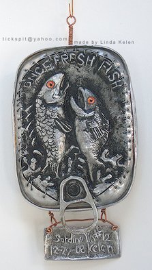 L. Kelen; SardineTin Number 12, 2009, Original Metalsmith, 3.4 x 7 inches. Artwork description: 241 Sardine tin altered with chasing/ repousse work. . . one of three showing in Chicago at the Woman Made Gallery, January 23- February26.TEL. . . 312 738 0400...