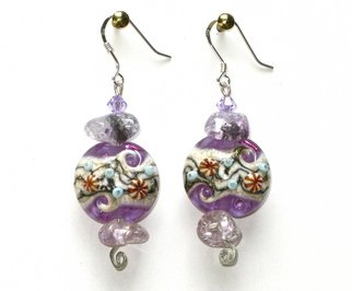 Cheryl Brumfield-Knox; Purple Waves Earrings, 2011, Original Jewelry,  2 inches. Artwork description: 241   Purple Waves is ( sea) worthy of the beach diva to the beach bum, and everyone in between! Each stunningly detailed SRA artisan lampwork lentil orb of the sand and sea, including little urchins, is a world onto itself. They are combined with Swarovski crystals, quartz crystals and ...