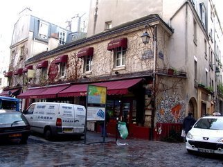 Luise Andersen, 'Paris Series  Streets Of ...', 2007, original Photography Other, 10 x 8  inches. Artwork description: 77547 Yes. . This very famous place. .  I like the artpiece on the side. .  and the hues of red on the window awnings, , , enlarge it, and see. . Plus as I recall. .  anniversary info in middle top. .  see, how wintery the air' feels' . .  wet too. .  ...