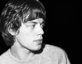 Paul Berriff; Mick Jagger, 1964, Original Photography Black and White, 33 x 22 inches. Artwork description: 241  Mick Jagger in his dressing room at the Gaumont Theater in Doncaster, England 1964 during The Rolling Stones tour.  The photograph comes signed on the verso by the photographer Paul Berriff with limited edition number and authenticity certificate ...
