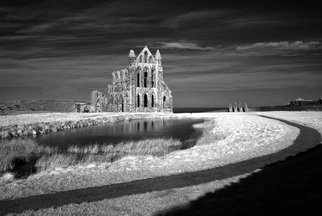 Paul Berriff; Whitby Abbey, 2019, Original Photography Black and White, 23 x 16 inches. Artwork description: 241 Whitby Abbey photographed in dramatic light. This is where author Bram Stoker originated his Dracula novel in 1890. It was below the abbey where the Russian ship Dmitry ran aground inspiring Stoker s start to the Dracula story. This is a limited edition photo which comes signed ...