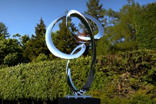 Paul Wesson; The Track 3, 2016, Original Sculpture Steel, 58 x 90 cm. Artwork description: 241 Highly Polished Stainless Steel Looping Sculpture. Suitable for both indoor and outdoor display, home, office, garden, yard etc. For sale by it s creator the brilliant professor of sculpture Paul Wesson. ...