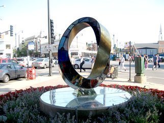 Plamen Yordanov; LIGHT INFINITY Homage To ..., 2016, Original Sculpture Bronze, 50 x 74 feet. Artwork description: 241 Light Infinity, homage to Frank Lloyd Wrightmaterials bronze, leaded stained glass, LED lights, mirrors, remote, patina. Infinity Mobius Strip refers to several distinct concepts, linked to the idea of without end which arise in philosophy, mathematics, and theology. The sculpture is based on the Mobius strip, ...