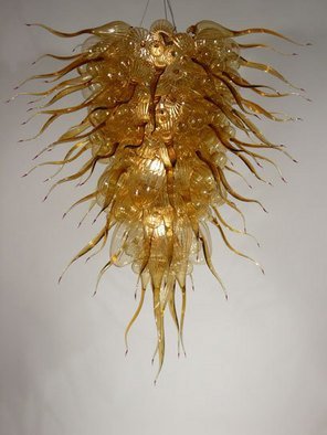 Ed Pennebaker; Ensiform Chandelier Number 391, 2006, Original Glass Blown, 38 x 44 inches. Artwork description: 241 Can take commissions to make similar works.   205 individual blown glass pieces assembled on a metal armature with 2 light bulbs.  Amber with wine tips...