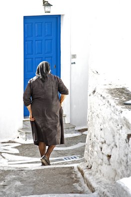 Frits Selier; Greek Woman, 2012, Original Photography Color, 40 x 30 cm. Artwork description: 241  Greek woman before a blue door at Naxos, Greece ...