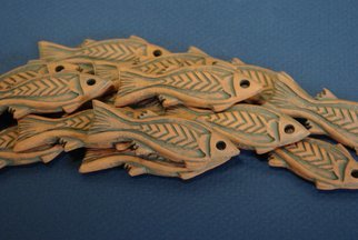 Andrew Tarrant; Roman Style Fish Pendants, 2009, Original Ceramics Other, 2.5 x 0.5 inches. Artwork description: 241   Custom work for the Canadian badlands Passion Play Gift Shop. Styled after Roman Samian Ware and meant to reflect what a Christian of 2000 years ago would have used.  ...