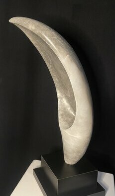 Terry Mollo; Smokey Crescent, 2023, Original Sculpture Stone, 9 x 28 inches. Artwork description: 241 This alabaster stone is a dark, smoky combination of greys and black and off- white.  It was inspired by a crescent moon that appeared out of dark swirly clouds after a storm.  Ethereal.  ...