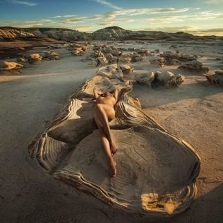 Dario Impini: 'oyster bed', 2018 Digital Photograph, Nudes. A 2 mile hike into a barren wilderness to the cracked egg field of Bisti, an unusual, isolated landscape of tortured erosion. Navigating back to a lonely car in the middle of nowhere on a moonless night, dead reckoning after our GPS phone guidance died was a little exhilarating.This ...