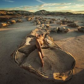 Dario Impini: 'oyster bed', 2018 Digital Photograph, Nudes. Artist Description: A 2 mile hike into a barren wilderness to the cracked egg field of Bisti, an unusual, isolated landscape of tortured erosion. Navigating back to a lonely car in the middle of nowhere on a moonless night, dead reckoning after our GPS phone guidance died was a little ...
