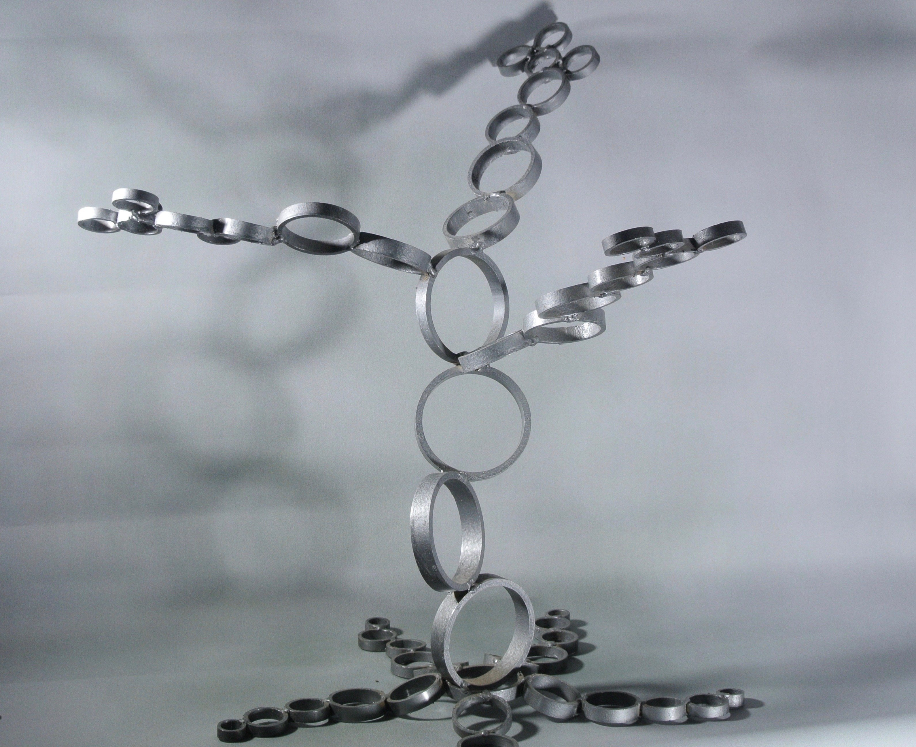 Diana Carey: 'Infinitree', 2015 Steel Sculpture, Abstract. The vastness of infinity captured in this abstract tabletop steel sculpture. Each ring bringing infinity to your tabletop. ...