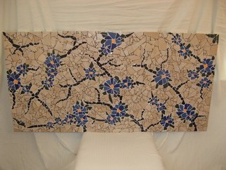Dragana Argirovic: 'Stubborn', 2015 Handbuilt Ceramics, Floral.   It represents thirsty, dry, cracked soil, opposite to blue, juicy flowers, because life always finds way! The tiles were created with a hammer only. Very dynamic rotation of bigger and smaller pieces and very dramatic look of black cracks and blue flowers will makes your eyes nailed on Stubborn!  ...