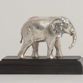 Heinrich Filter: 'Elephant in Sterling silver', 2013 Other Sculpture, Wildlife. Artist Description: Baby elephant sculpture in Sterling silver on ebony base by Heinrich Filter; Sterling silver weight approx 580grams; also available in bronze. ...
