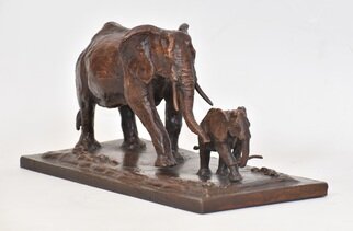 Heinrich Filter: 'in step elephant sculpture', 2023 Bronze Sculpture, Wildlife. In Step - Bronze Elephant Sculpture, Limited Edition of 24, Length 27 cm x Height 14 cm x Width 12. 5 cm, bronze sculpture on bronze base.My latest creation,  In Step,  is a bronze sculpture that immortalises the tender bond between a mother elephant and her calf.Every curve and ...