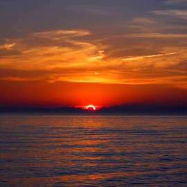Jeanette Locher: 'eclipse sunset', 2017 Color Photograph, Beach. Artist Description: best sunset shot of the summer...
