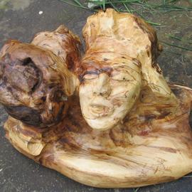 John Clarke: 'reunion', 2015 Wood Sculpture, Abstract Figurative. Artist Description: Two faces, dark and light, in two connected cherry burls...